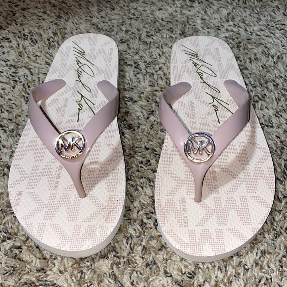 MK light pink flip flops
